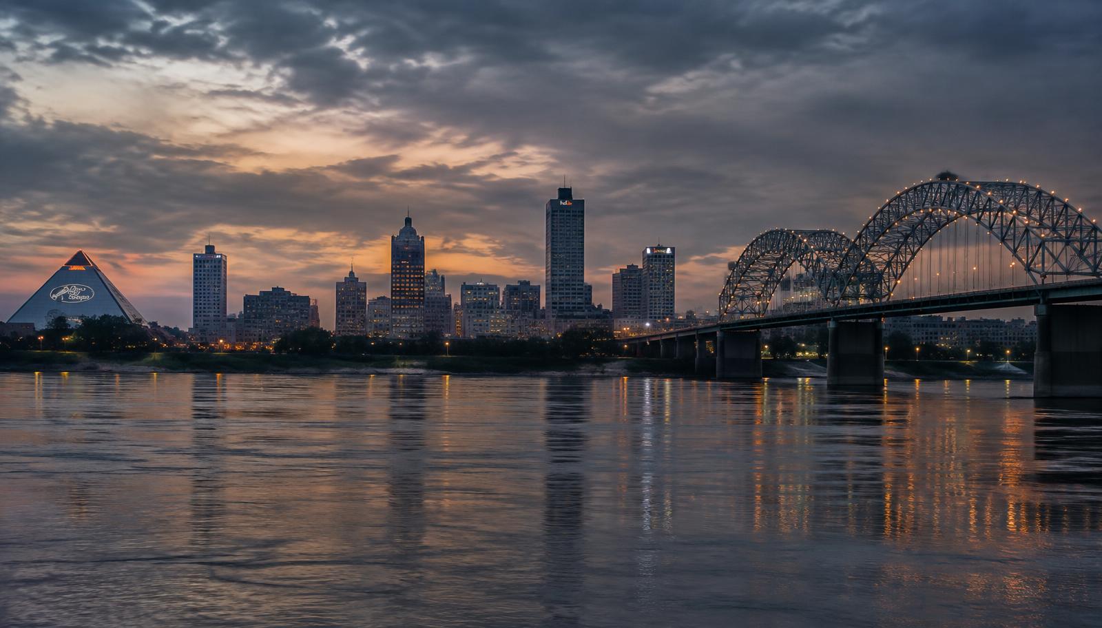 The Memphis skyline at dusk across the Mississippi River